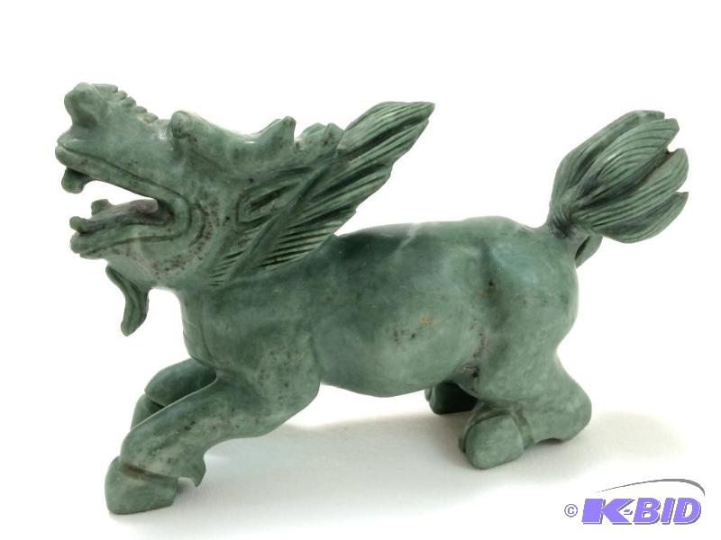 lot 7 image: Large Carved Green Stone Dragon
