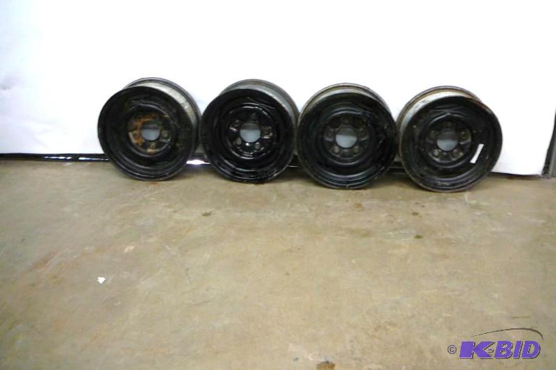 4- Ford Steel Wheels 15 x7 5 hole...