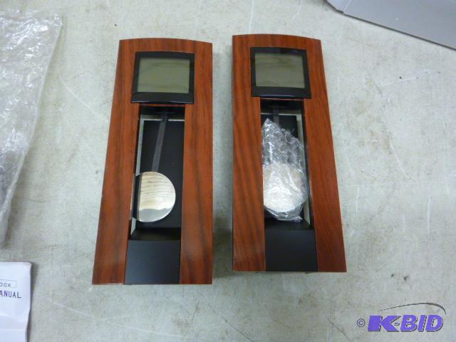 lot 107 image: Two Digital Pendulum Clocks...
