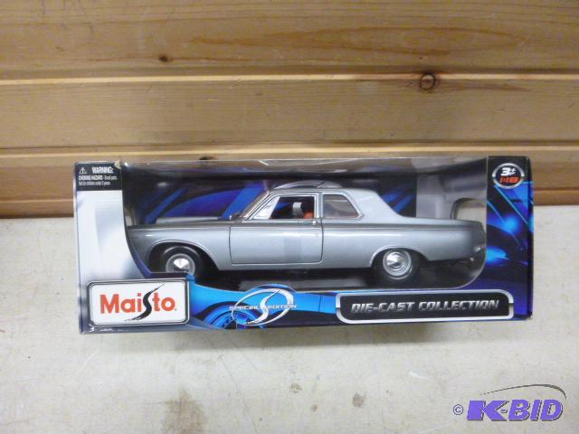 lot 28 image: 1963 Dodge 330 Maisto metal die cast car, 11...