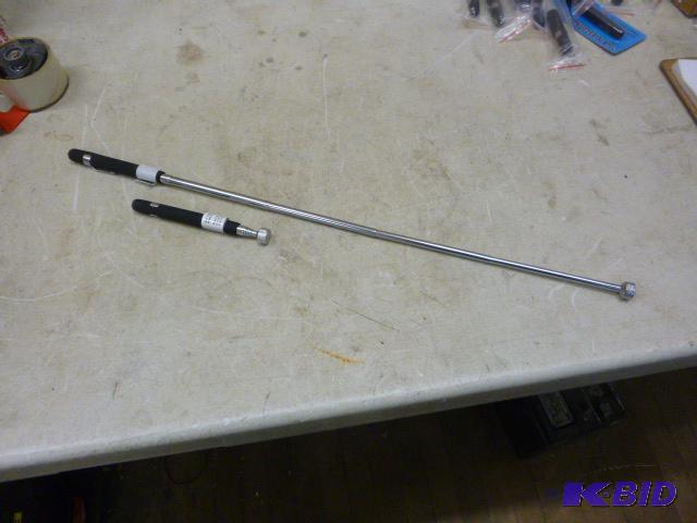 lot 62 image: Two Telescoping Magnetic Pickup Tools Expands...