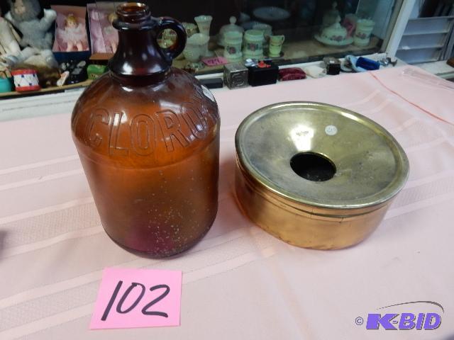 lot 102 image: Clorox jug and Brass Spitoon