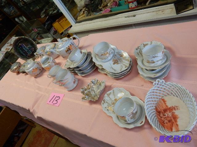 lot 113 image: Tea set, plate combo.. Matching CreamSugar.. Tea pot. Other glass as pictured