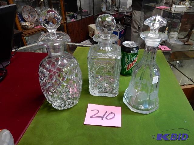 lot 210 image: 3 Liquor Decanters includes a COIN Theme.