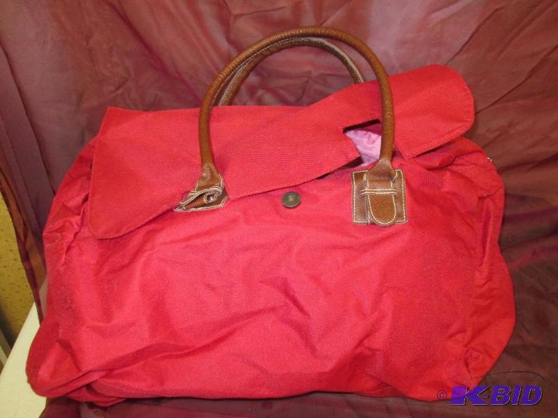Red nylon magnetic snap bag, appears new...