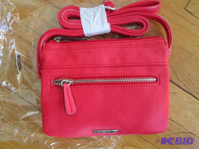 lot 24 image: COCO  CARMEN red purse...