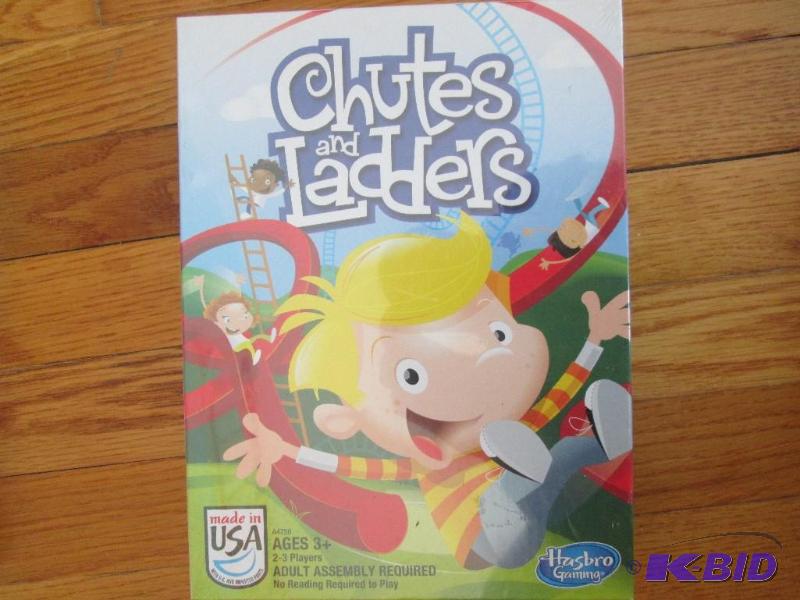lot 51 image: Chutes and Ladders shrinkwrapped game...