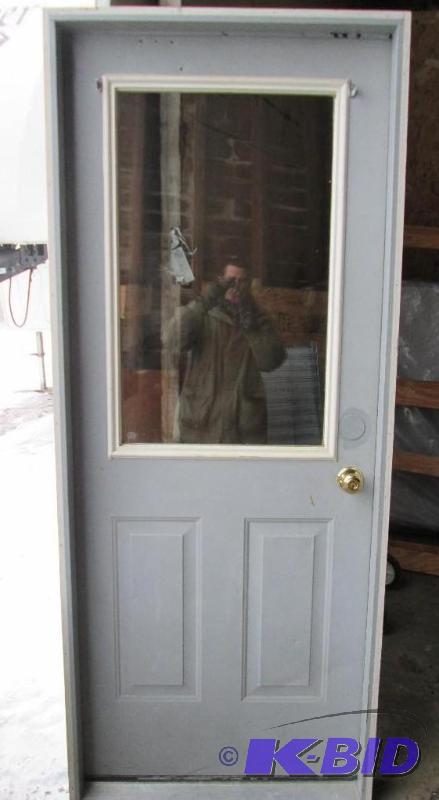 lot 95 image: Exterior insulated door with large double pan...