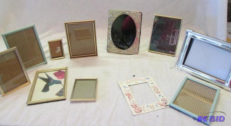 mixed lot of various sized picture frames...