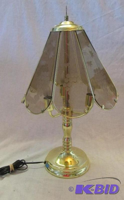 gold colored metal lamp with grapes on glass ...