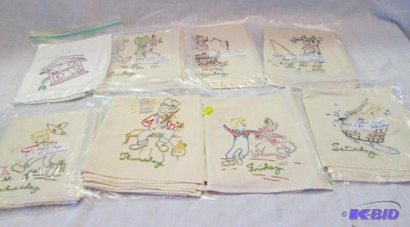 lot of embriodered day of the week dish towel...