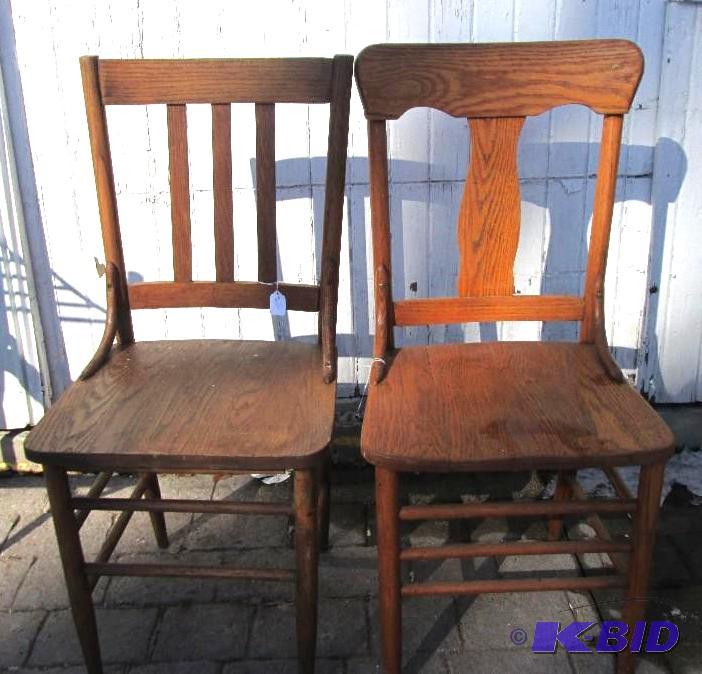 2 solid wood chairs- matching, one with a sin...