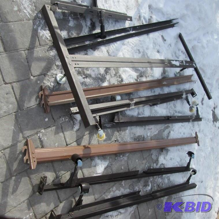 lot of metal bed frames...