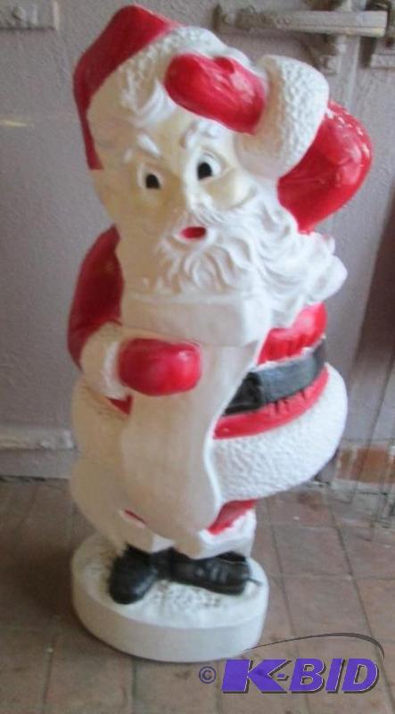 lighted plastic santa with wieghted base stan...