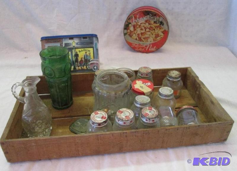 vintage tins, jars and glasswear in wooden fl...