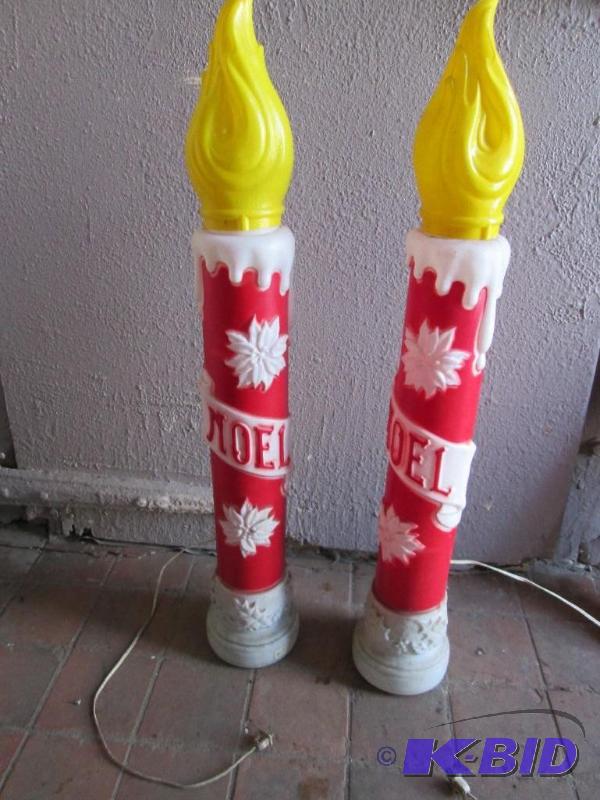 2 large neol plastic plug in candles...