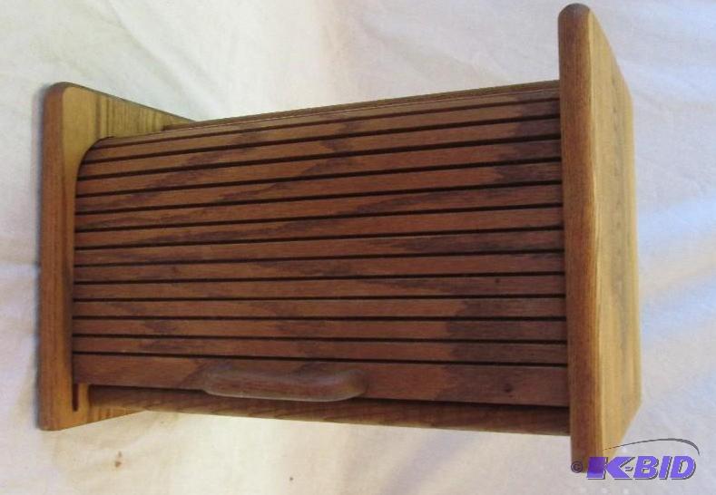 wooden bread holder with slid up cover...