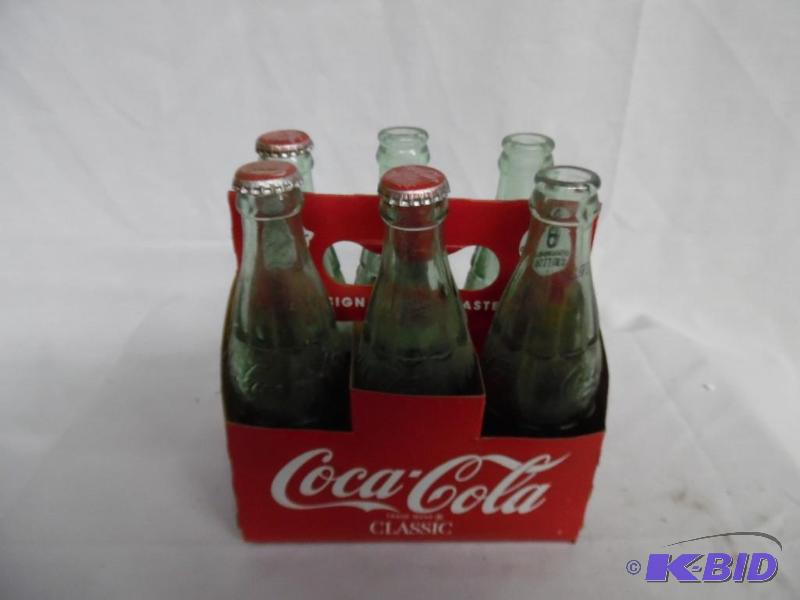 lot 46 image: 6 Glass Coca-Cola Bottles w Case