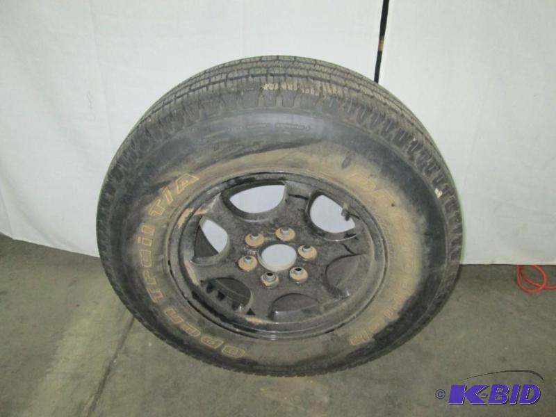 lot 58 image: BF Goodrich Tire and Rim