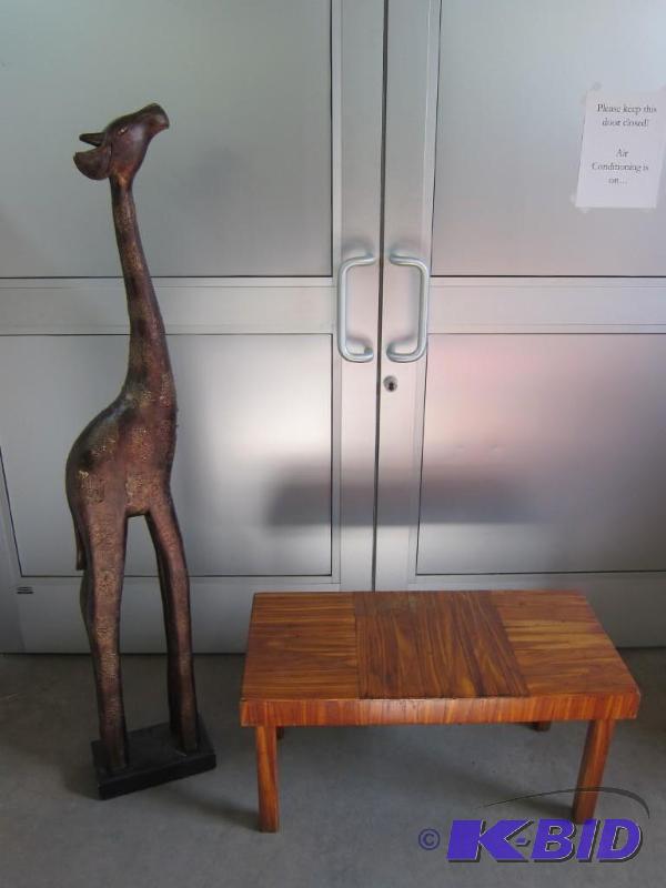 Bench and giraffe