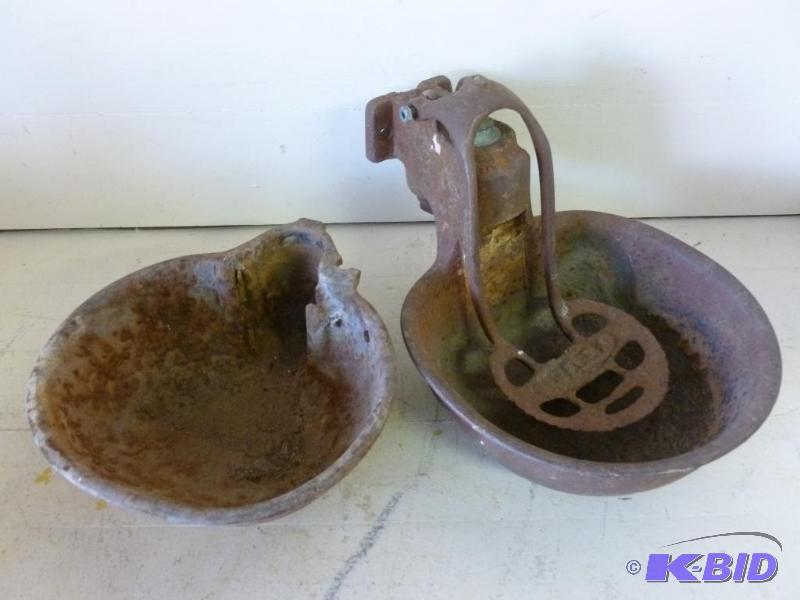 lot 11 image: Lot of two vintage cattle drink cups....