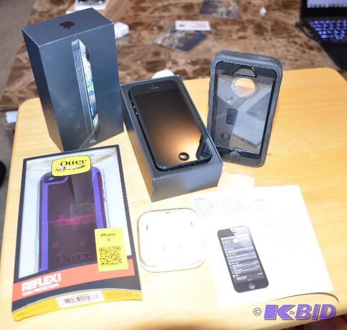 lot 72 image: iPhone 5 AT&ampT with original box, 2 Otter ...
