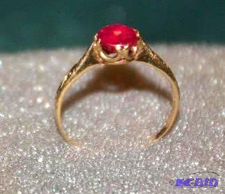 lot 95 image: Gold Ring with possible Ruby...