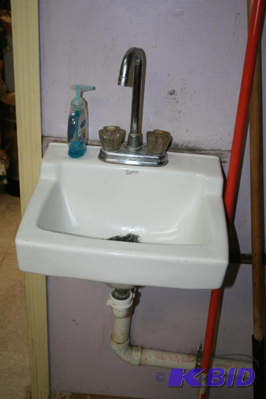 lot 12 image: White Porcelain Sink