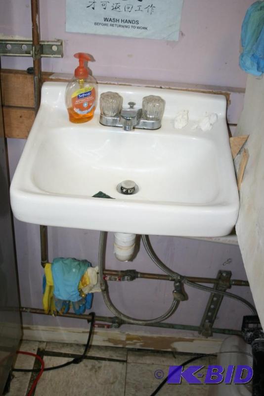 lot 21 image: White Porcelain Sink