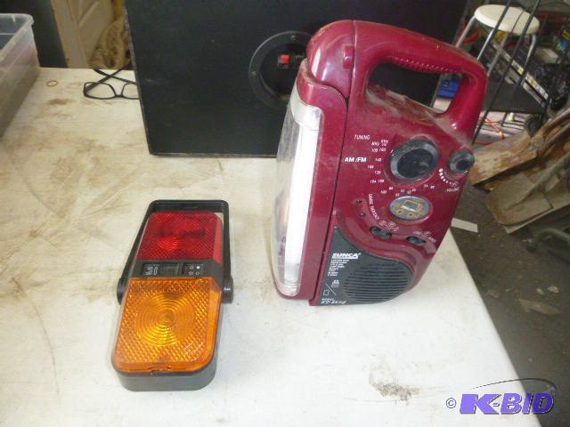 Two Safety Lights One with AMFM radio, clock...
