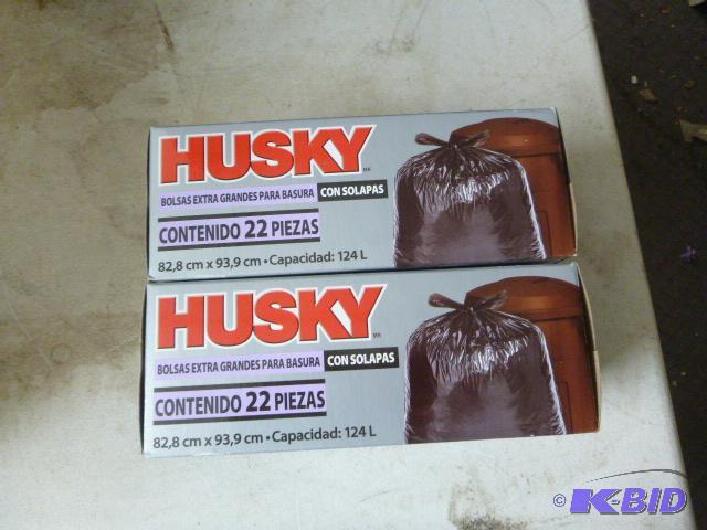 Two Boxes of Husky Flap Tie Trash Bags 33 gal...