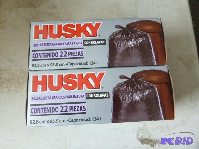 Two Boxes of Husky Flap Tie Trash Bags 33 gal...