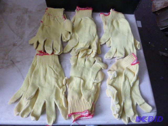 Six Pairs of One Size Fits All Gloves...