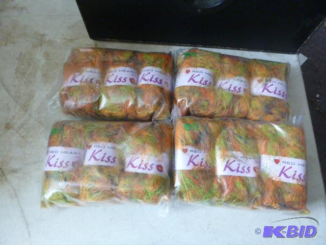 Four Packs of 3 Red Heart Kiss Yarn...