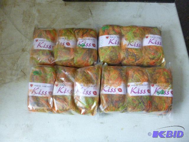 Four Packs of 3 Red Heart Kiss Yarn...