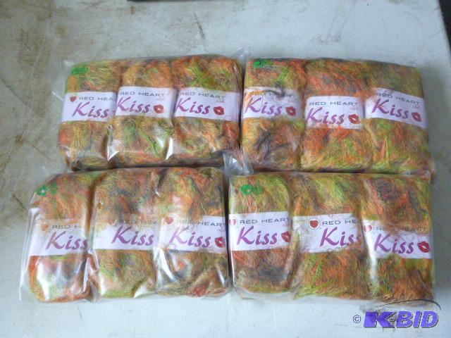 Four Packs of 3 Red Heart Kiss Yarn...