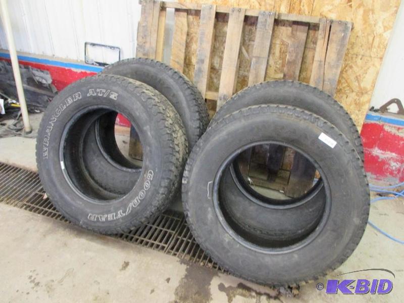 4 Goodyear Wrangler LT27565R18 tires, 632 t...