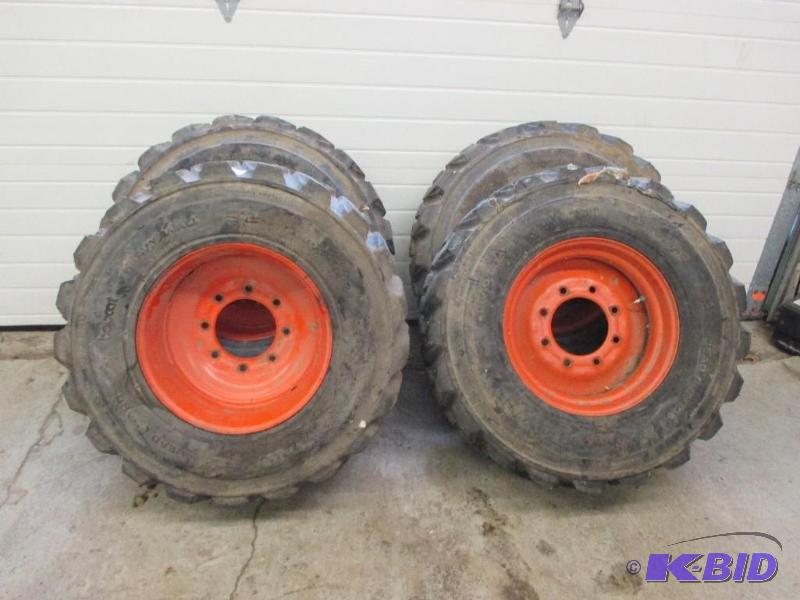 4 bobcat rims and tires, rims very nice, tire...