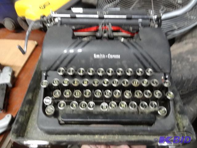 lot 30 image: Smith Corona vintage typewriter with case....