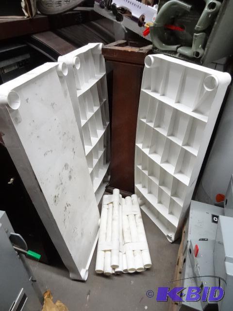 lot 40 image: Plastic shelving unit. 15 x 36 x 48...