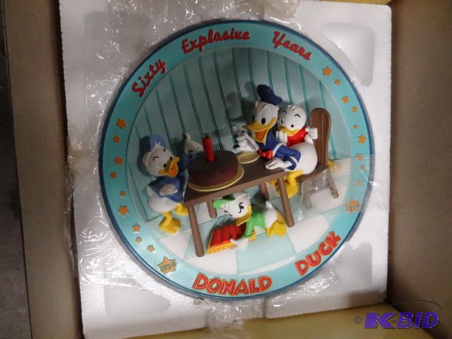 lot 58 image: Donald Duck sixty explosive years collector p...