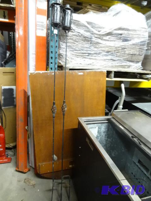 lot 7 image: 2 metal stake in the ground Tiki torches....