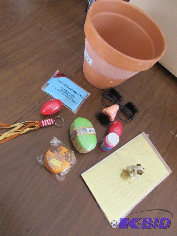lot 108 image: A Flower Pot and a bunch of stuff for the Easter Basket