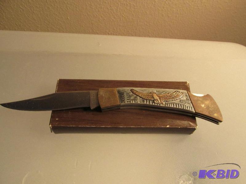 lot 194 image: Eagle Embossed Pocket Knife with Engraved Eagle on Blade