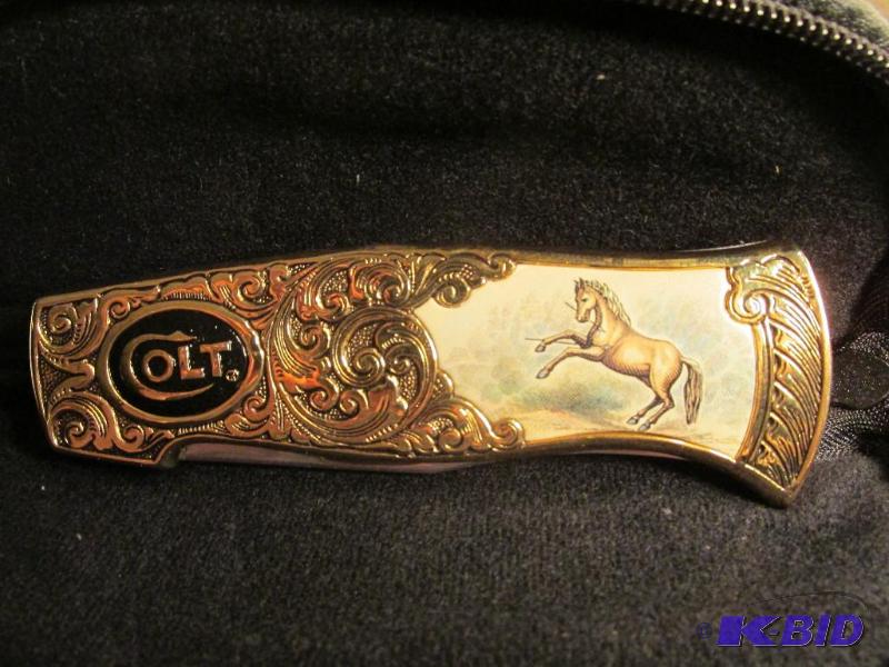 lot 217 image: Franklin Mint - COLT - elaborate design - with a scrolled blade