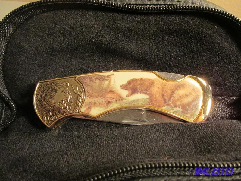 lot 218 image: Franklin Mint - Bear Fishing for Salmon Scene and Embossed Handle