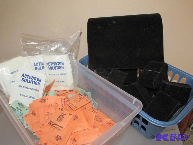 lot 238 image: Many Many Sizes of Watch Crystals and a Box Full of Watch Pillows