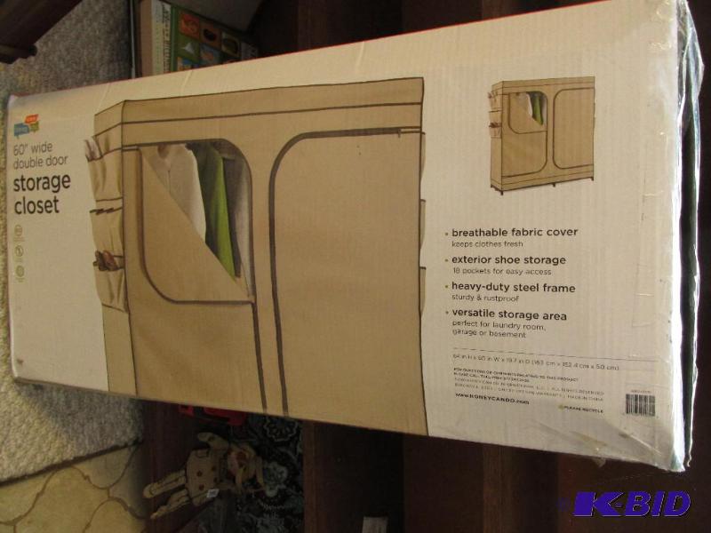 lot 29 image: 60 Wide Double Door Storage Closet - NEW in the Box