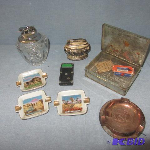 lot 141 image: Tobacco Tins, Lighters