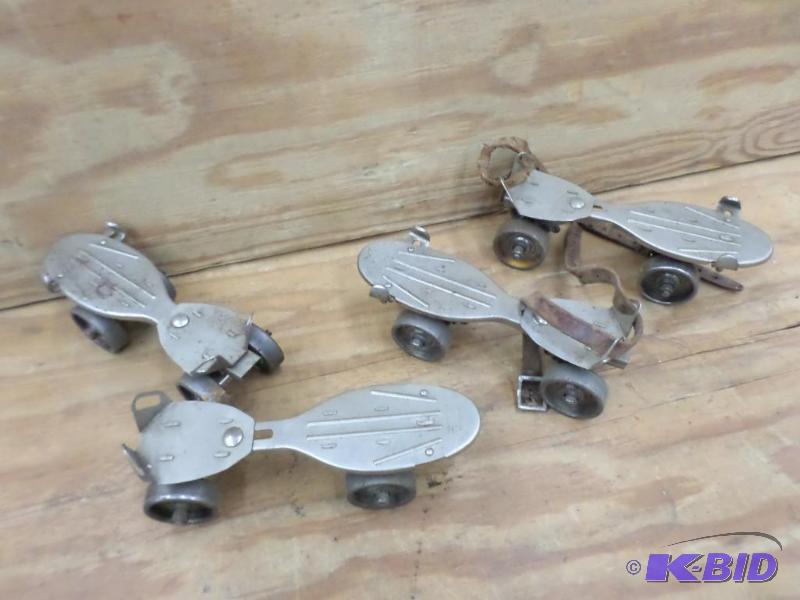lot 108 image: (2) Sets Of Antique Roller Skates...
